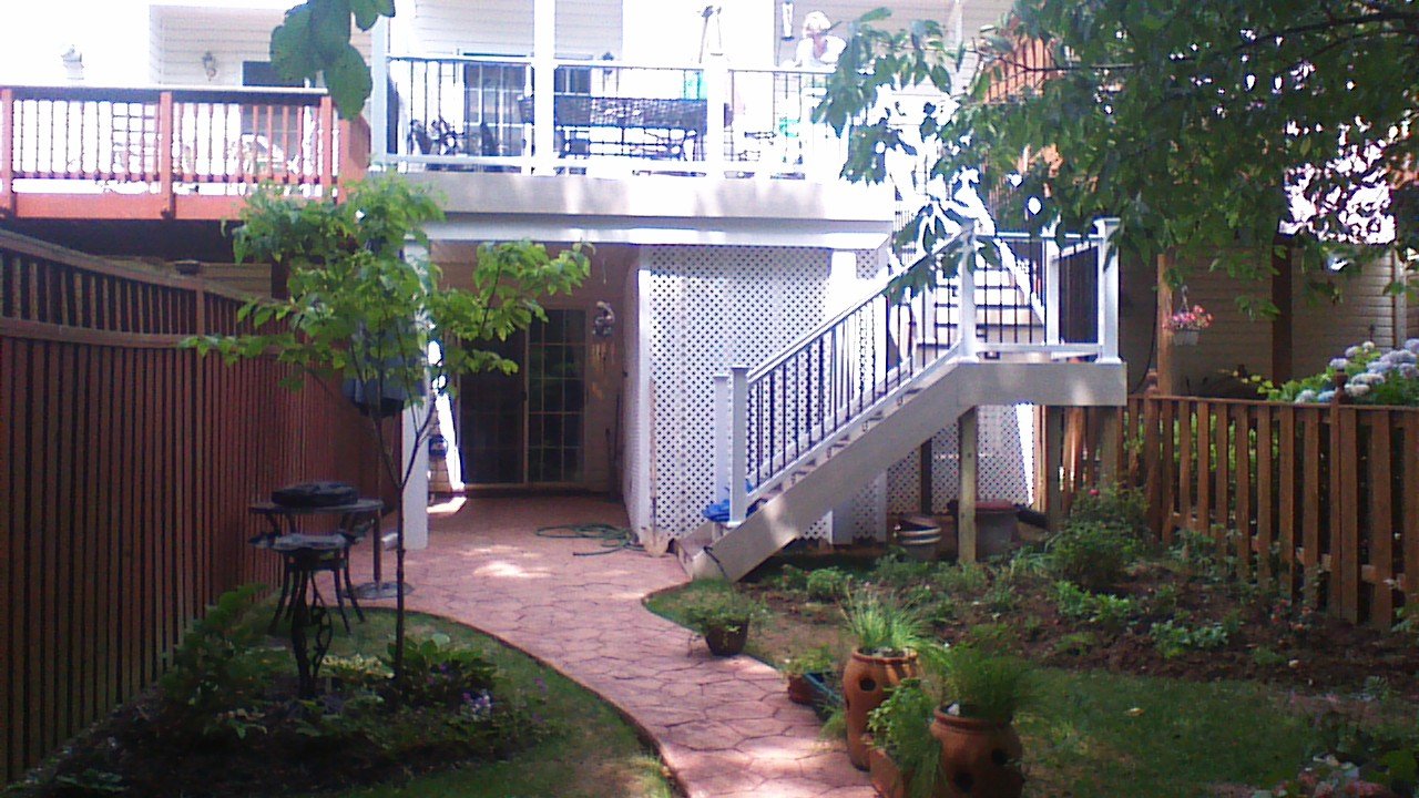 Multi-level deck with patio and garden